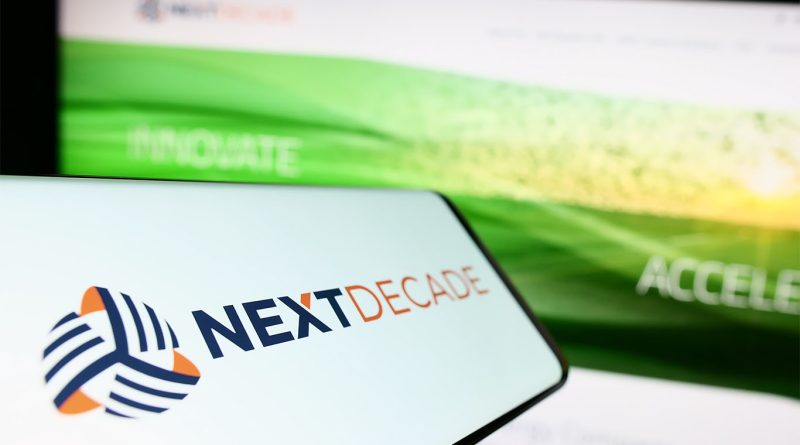 NextDecade logo on phone screen to support Rio Grande LNG article