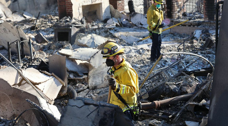 Fire fighters assessing damage of LA fires for Project Recovery