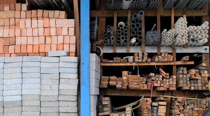 Construction materials piled up in yard
