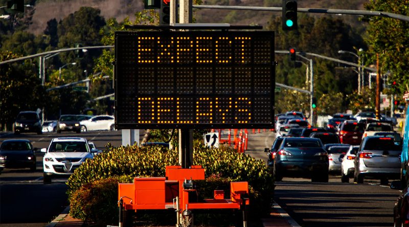 Expect delays sign in heavy traffic construction area