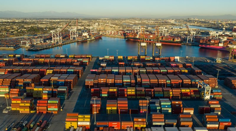 Aerial view of the Port of Long Beach container terminals with rail infrastructure under expansion