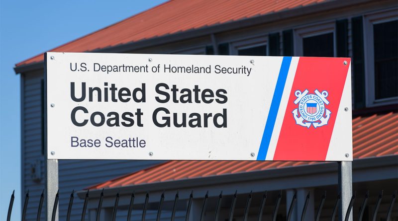 View of Coast Guard Base Seattle waterfront showing existing berths and ship mooring areas