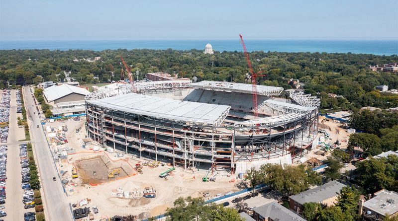 Construction workers and university officials attend the Ryan Field topping out ceremony at Northwestern in Evanston