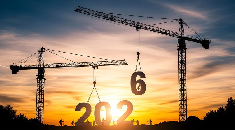 Construction site in the US with cranes and workers amid ongoing development