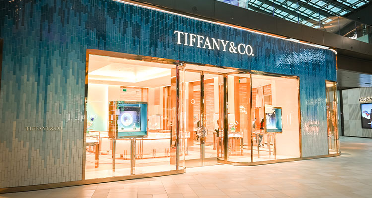 a Tiffany & Co. store featuring a dazzling blue facade
